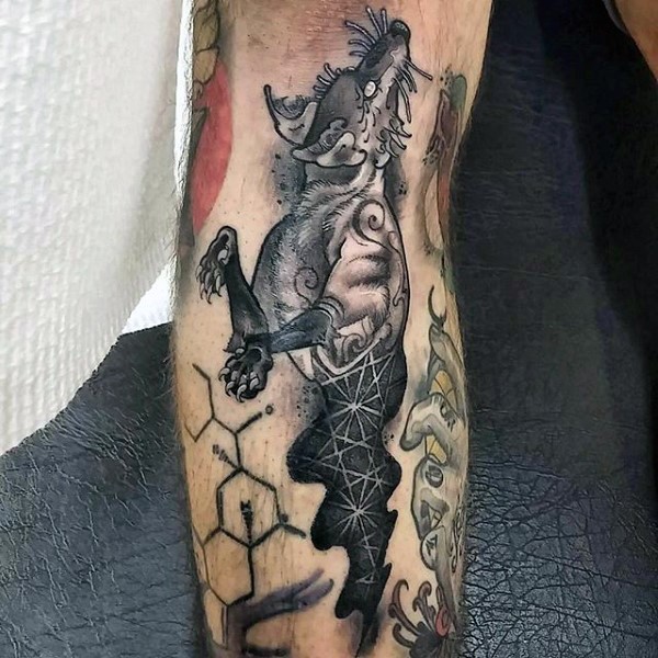 Engraving style black ink leg tattoo of fantasy wolf
