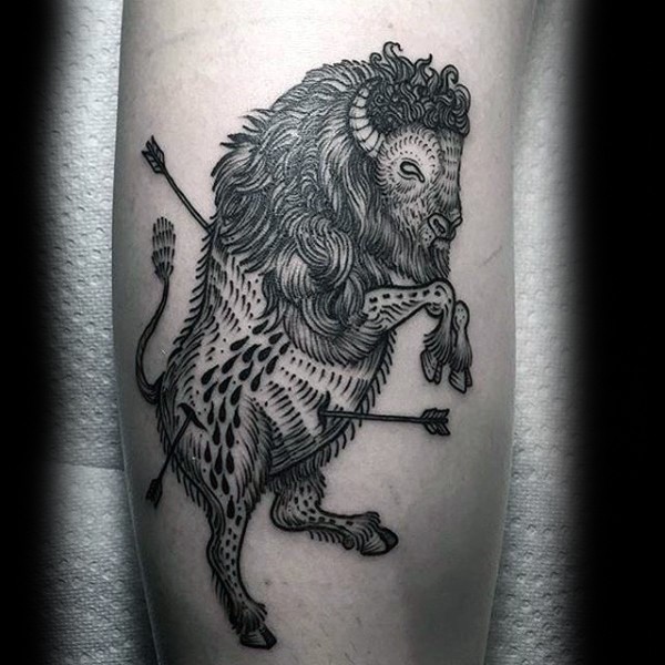 Engraving style black ink leg tattoo of grunting ox with arrows