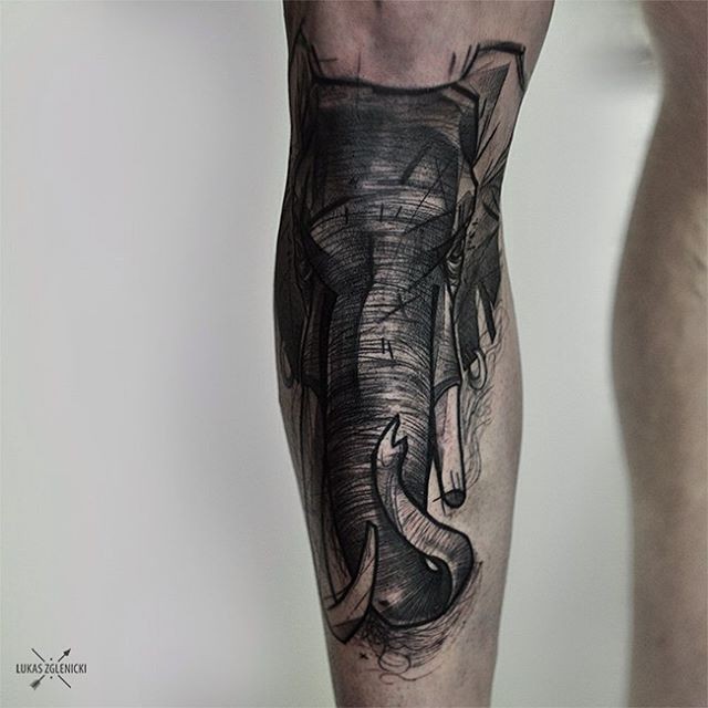 Engraving style black ink leg tattoo of detailed elephant