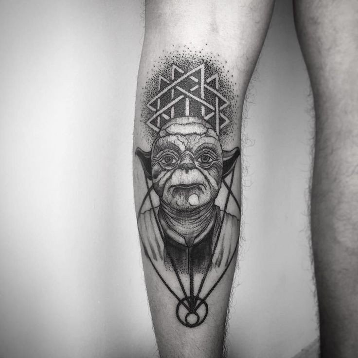 Engraving style black ink leg tattoo of Yoda with ornament