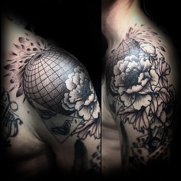 Engraving style black ink shoulder tattoo of big globe with various flowers