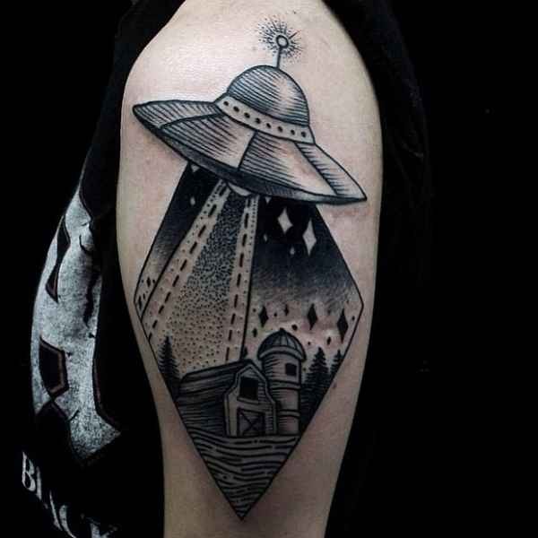 Engraving style black ink shoulder tattoo of alien ship and lonely farm