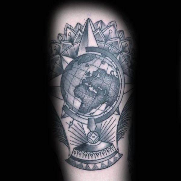 Engraving style black ink tattoo of big globe wiht symbols
