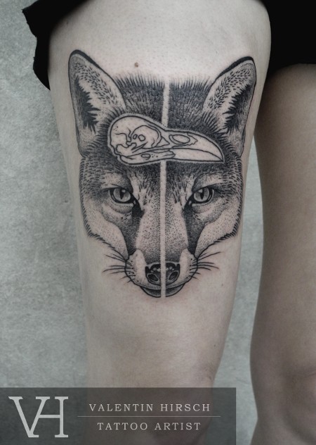 Engraving style black ink thigh tattoo of fox head with bird skull