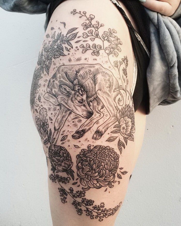 Engraving style black ink thigh tattoo of sleeping cow with flowers