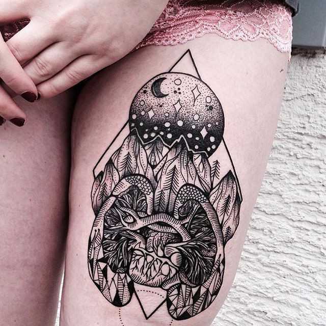 Engraving style black ink thigh tattoo of interesting looking picture with planet and stars