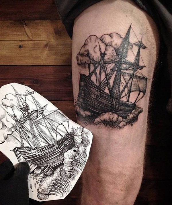 Engraving style black ink thigh tattoo of large ship