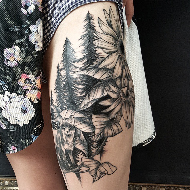 Engraving style black ink wild forest tattoo on thigh with fox and flowers