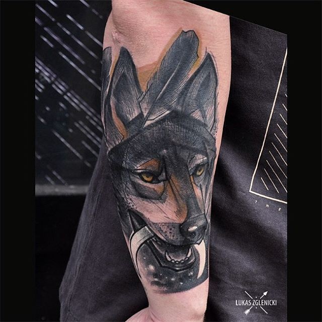 Engraving style colored arm tattoo of dog with moon