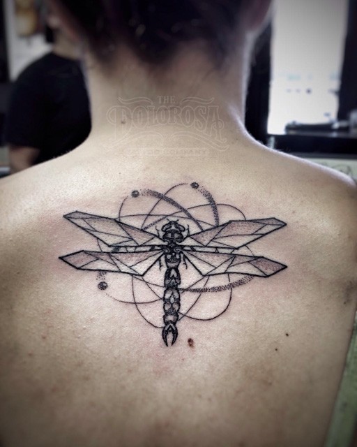 Engraving style colored back tattoo of dragonfly