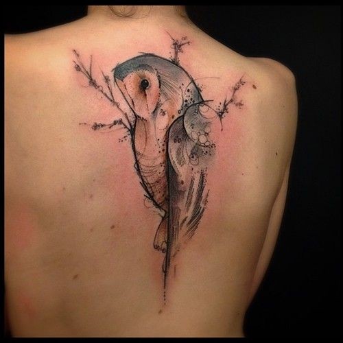 Engraving style colored back tattoo of beautiful owl