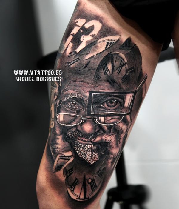 Engraving style colored biceps tattoo of old man with glasses and clock