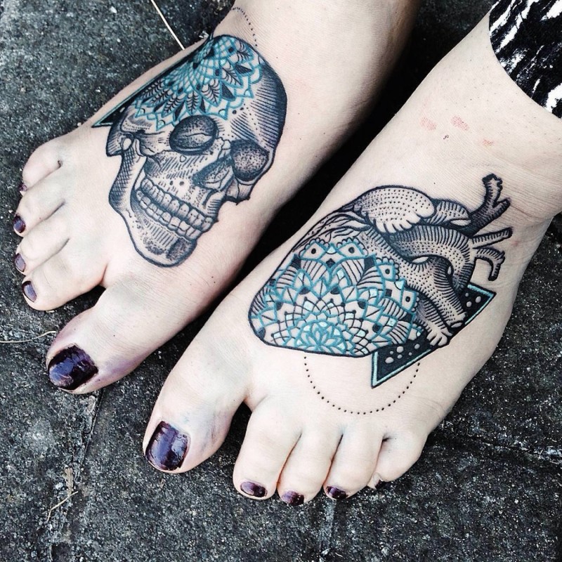 Engraving style colored feet tattoo of human skull and heart stylized with ornaments