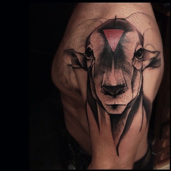 Engraving style colored shoulder tattoo of goat with red triangle