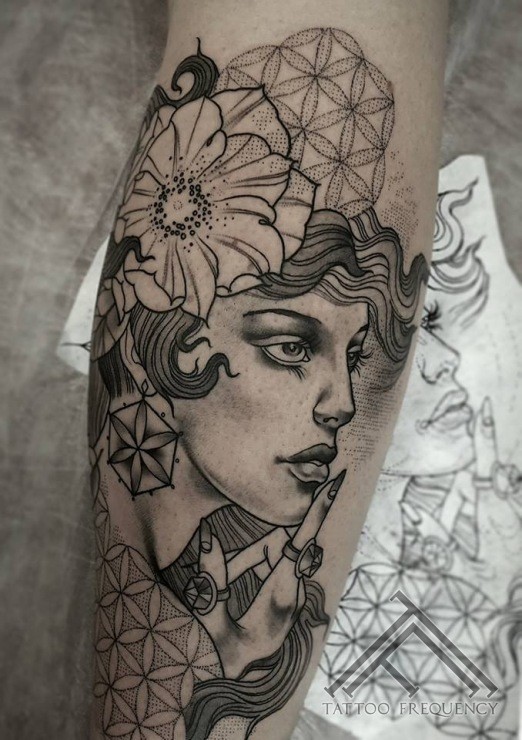 Engraving style detailed arm tattoo of woman face with flowers