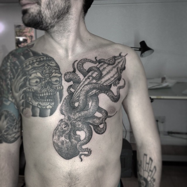Engraving style large chest tattoo of incredible octopus