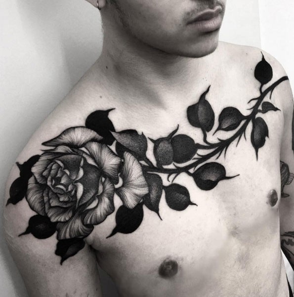 Enormous black ink collarbone tattoo of very big rose