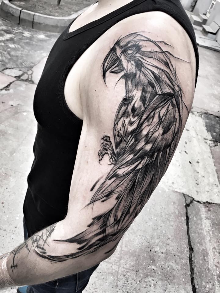 Enormous blackwork style painted by Inez Janiak half sleeve tattoo of cool parrot