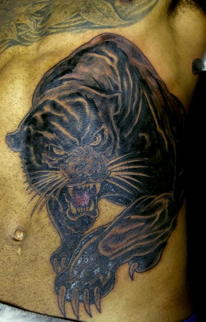 Evil black panther tattoo on belly
