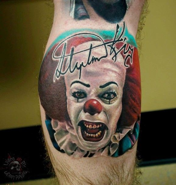 Evil clown with autographed tattoo on leg by Jerry Pipkins