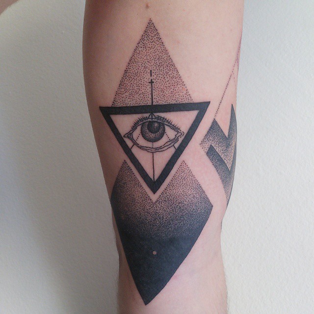 Excellent looking black ink arm tattoo of engraving style various geometrical figures with eye