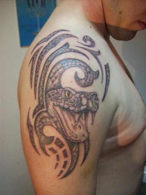 Tribal snake tattoo on half sleeve for men