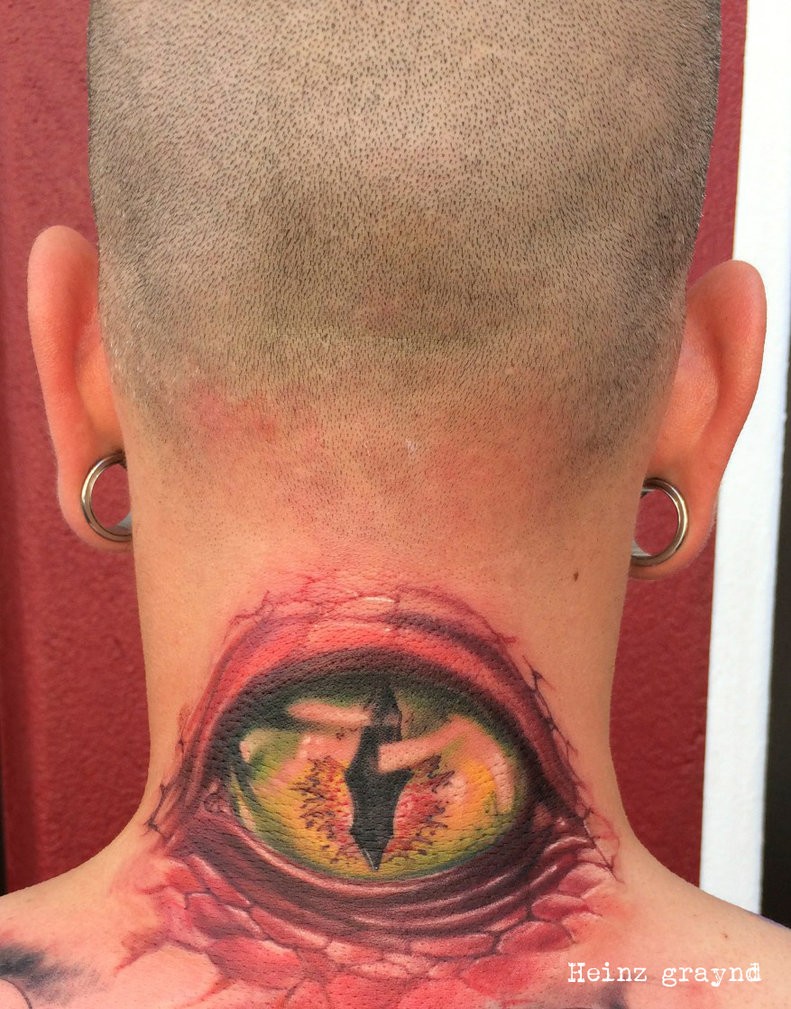 Eyeball tattoo on the back of the neck by graynd