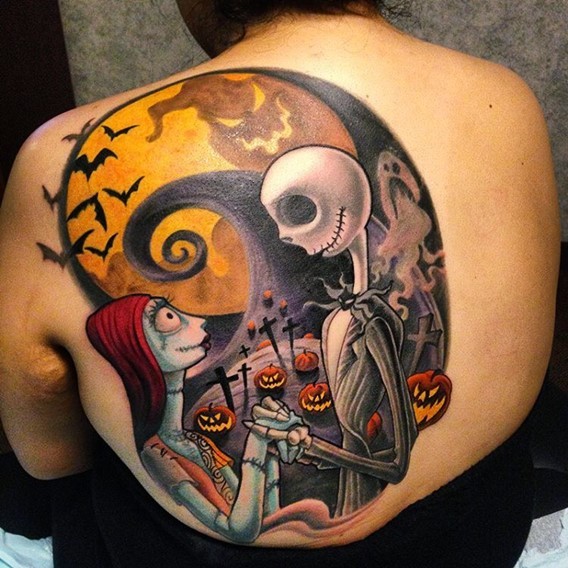 Famous monster cartoon heroes tattoo on back stylized with night cemetery