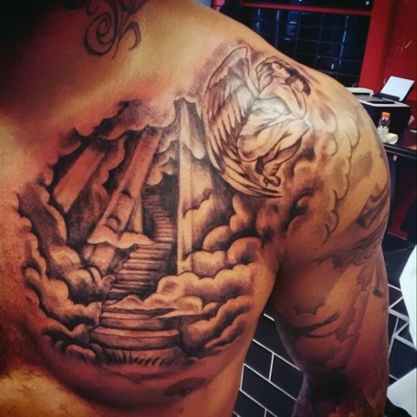 Fantastic black and white stairs to haven with angle tattoo on chest