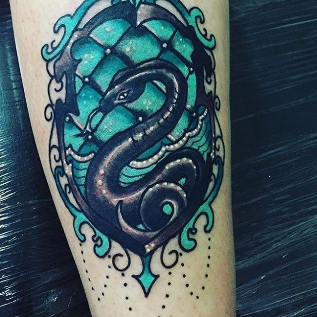 Fantastic colored arm tattoo of evil snake