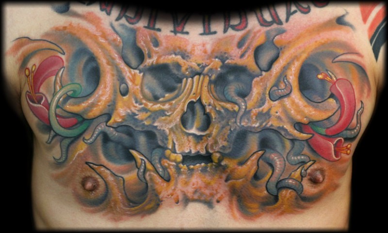 Fantastic colored chest tattoo of human skull with alien flowers