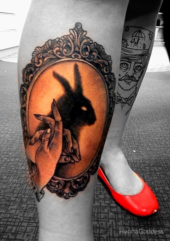 Fantastic designed big shadow play bunny portrait tattoo on leg