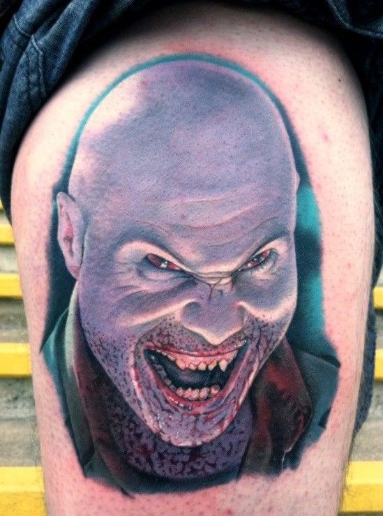 Fantastic horror movie like bloody vampire portrait tattoo on thigh