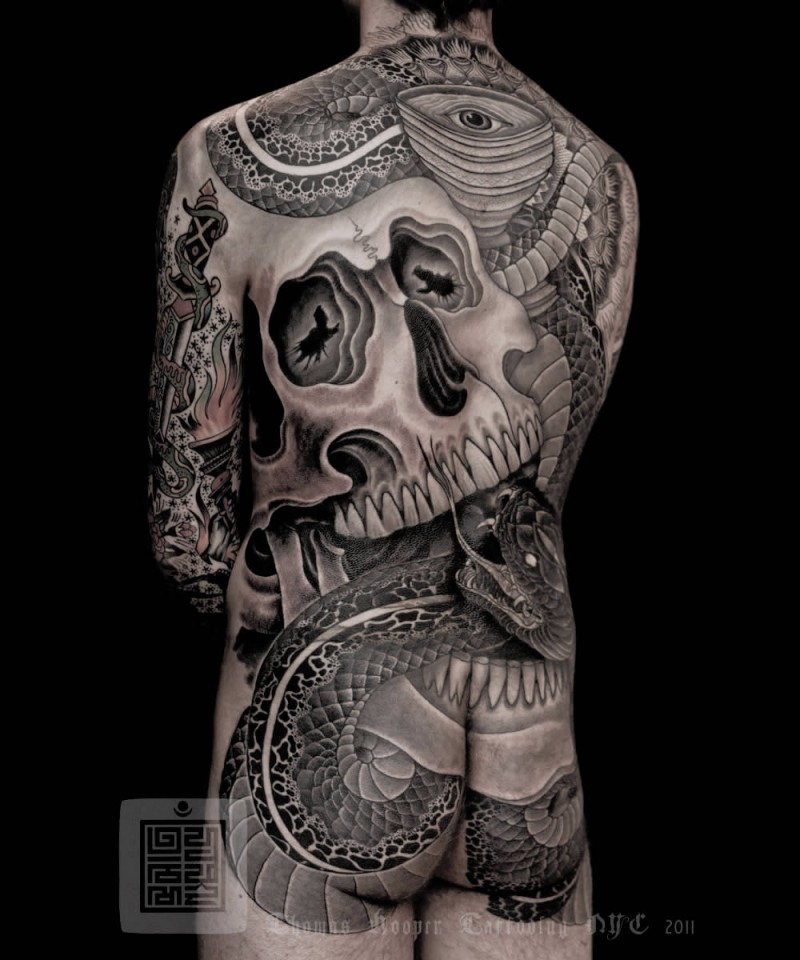 Fantastic neo japanese style black ink whole body tattoo of big snake with human skull and ornaments