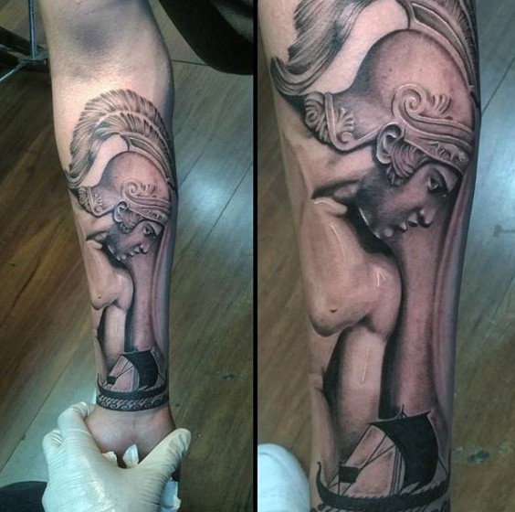 Fantastic painted black and white antic Greece warrior with ship tattoo on arm