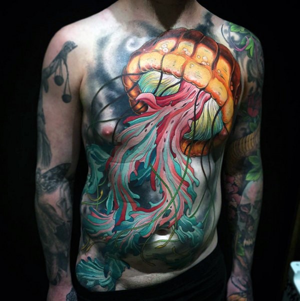 Fantastic painted very detailed colorful jellyfish tattoo on chest and belly