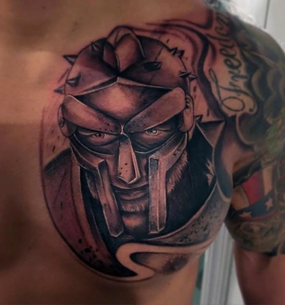 Fantastic video game hero like black ink portrait tattoo on chest