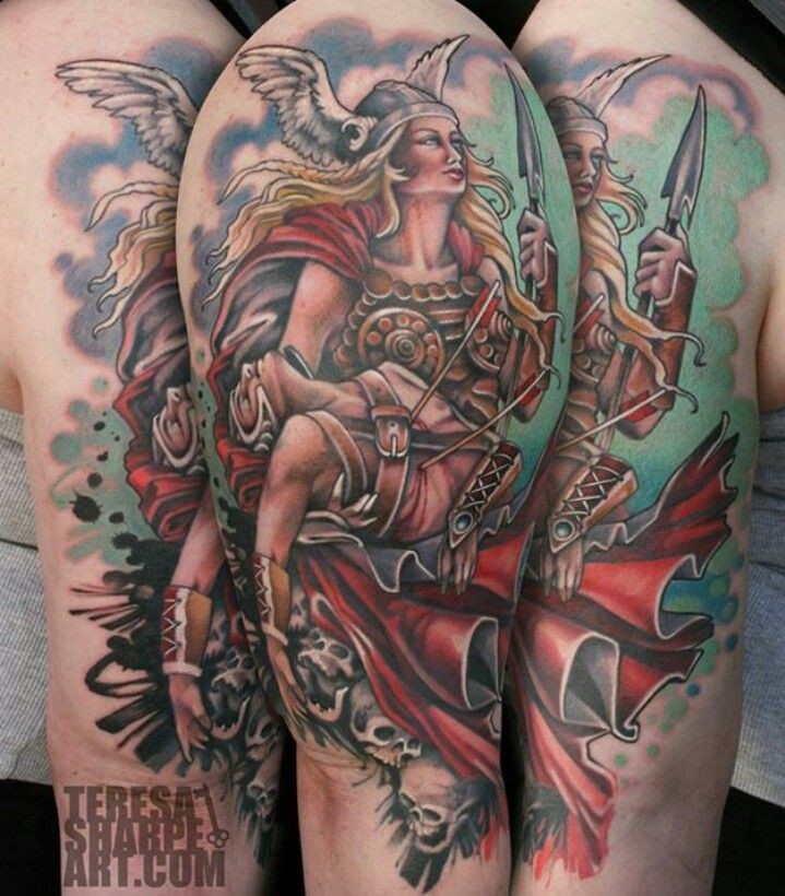 Fantasy cartoon themed  colored woman warrior with wounded man tattoo on shoulder