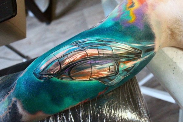 Fantasy illustrative style colored biceps tattoo of big ship