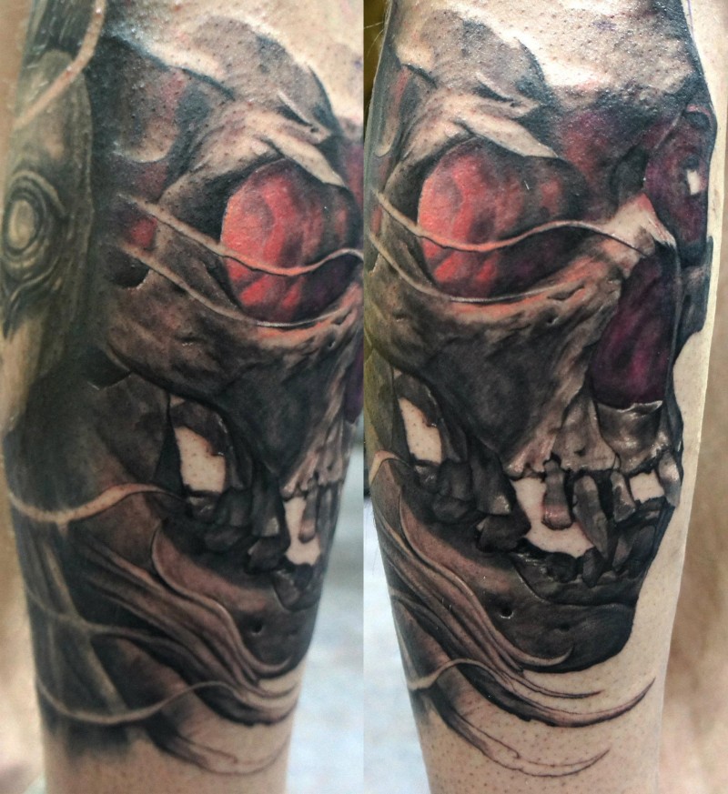 Fantasy style colored arm tattoo of incredible looking skull