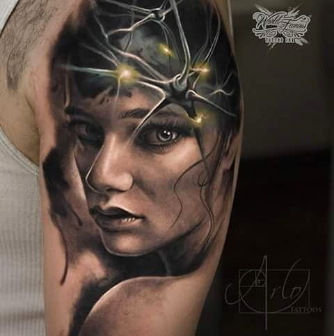 Fantasy style colored shoulder tattoo of woman portrait