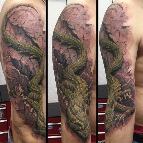 Fantasy style colored shoulder tattoo of large lizard