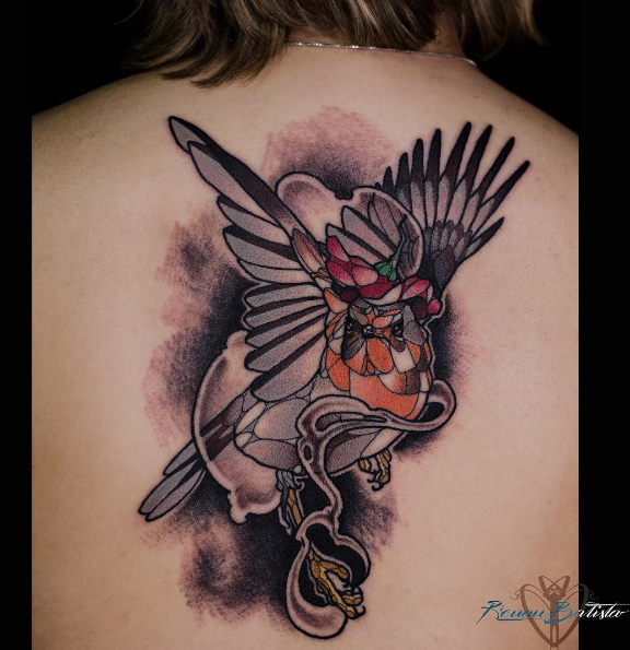 Fantasy style colored whole back tattoo of bird with jewelry
