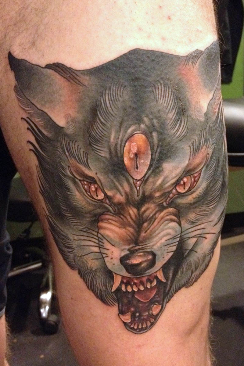 Fantasy world evil monster fox colored tattoo on thigh