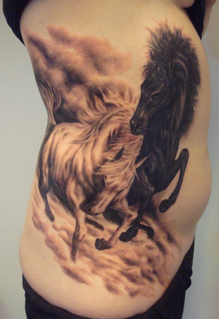 Fighting wild horses  tattoo by viptattoo