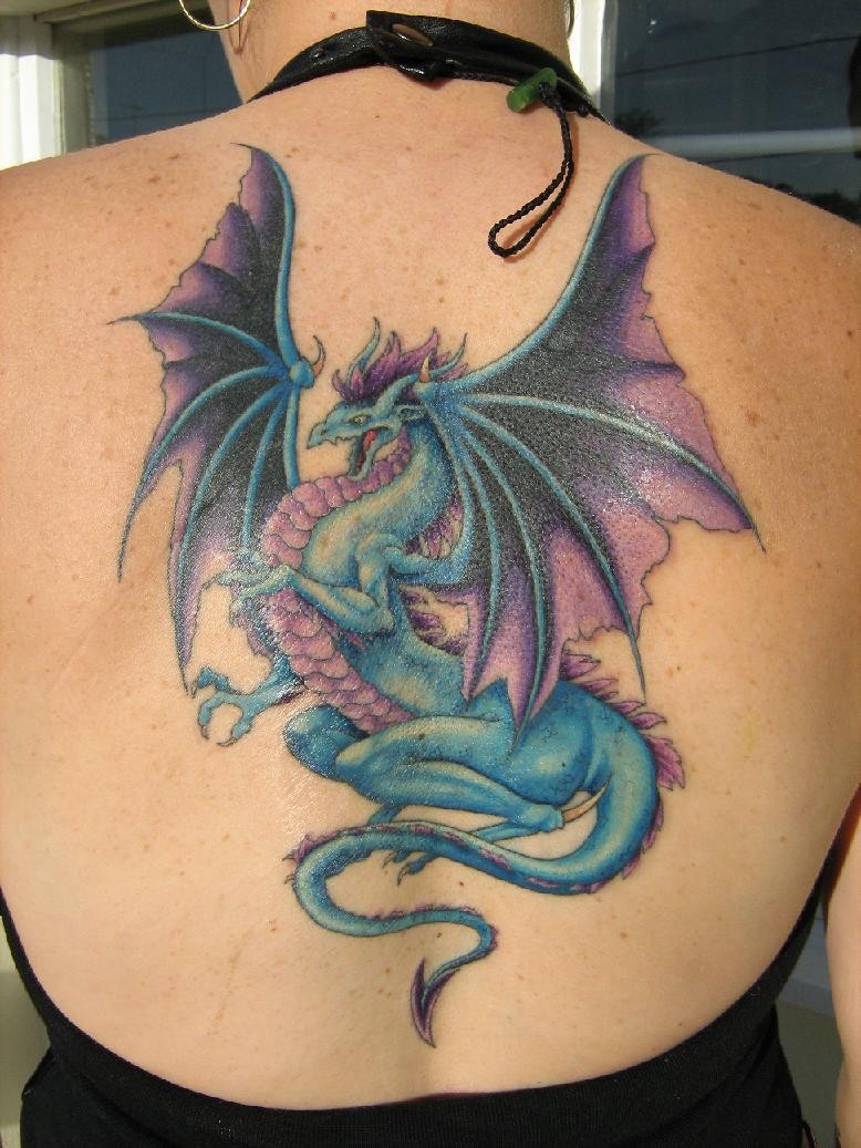 Flying purple dragon tattoo