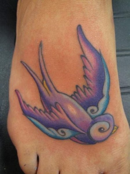 Foot bird tattoo