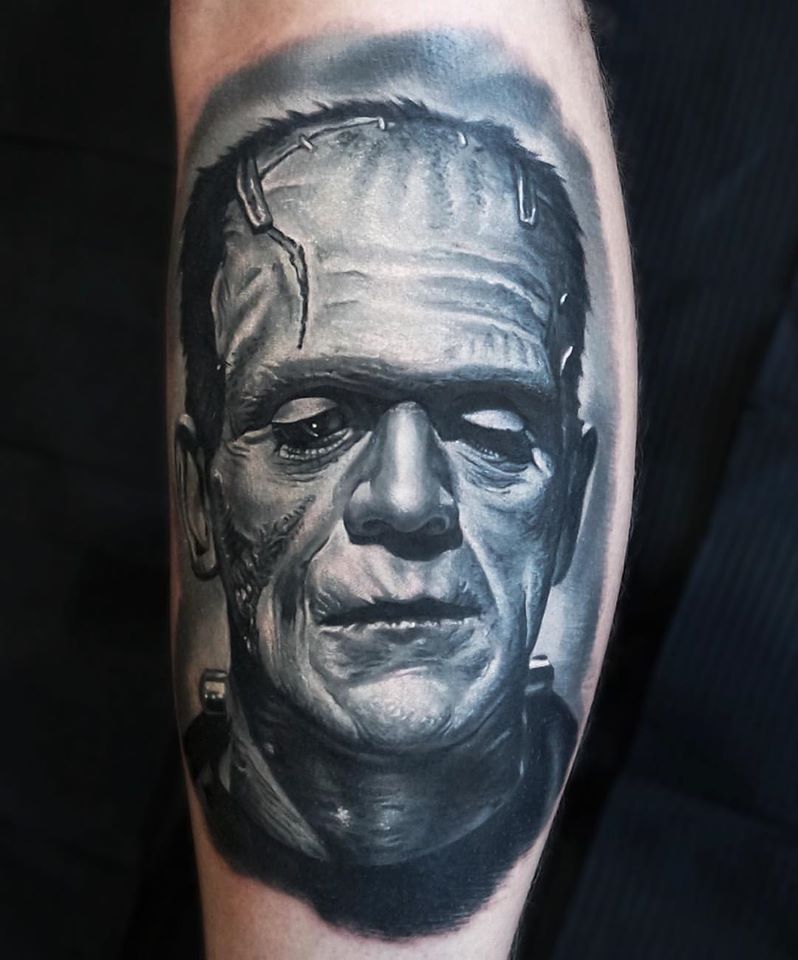 Frankenstein Monster in gray colors tattoo