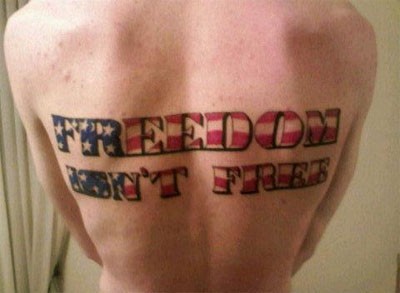 Freedom and american flag tattoo on back