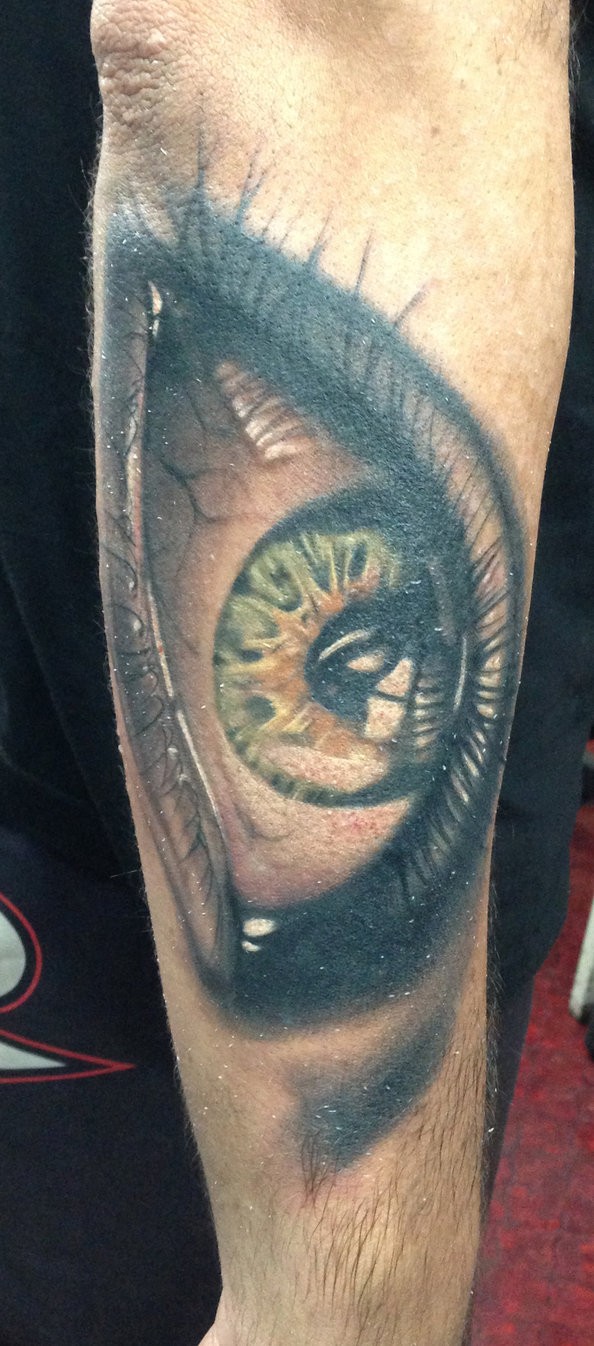 Freestyle eye tattoo by viptattoo